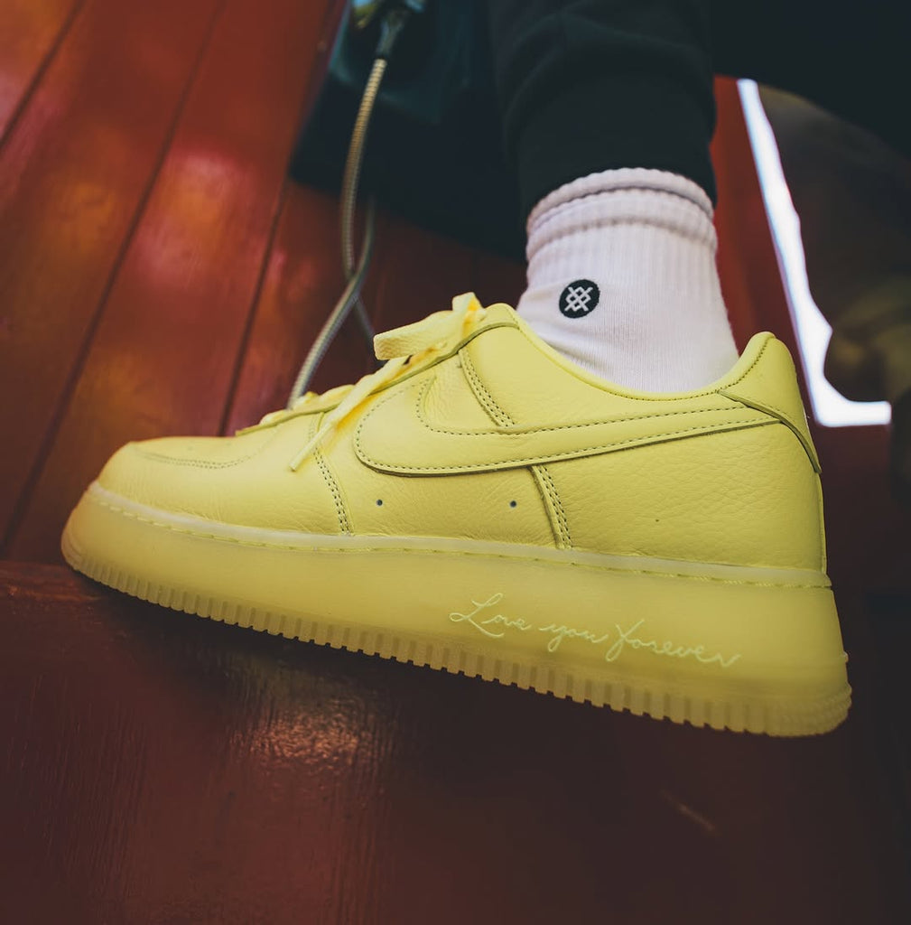Nike Air Force 1 Low Drake NOCTA Certified Lover Boy Citron Tint feet