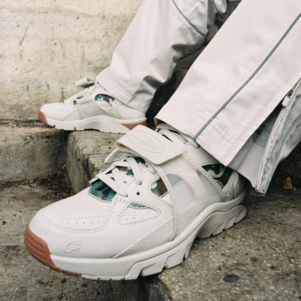 Nike Air Trainer Huarache Corteiz Light Bone  – sneaker autêntico da CollectKicks